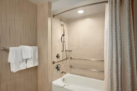 Combined shower/tub, designer toiletries, hair dryer, bathrobes