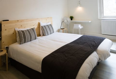 Basic Twin Room, Shared Bathroom | Desk, cribs/infant beds, free WiFi, bed sheets