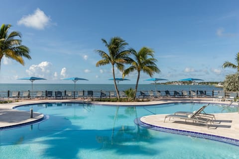 Outdoor pool, a heated pool, pool umbrellas, sun loungers