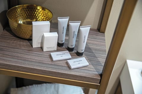 Shower, rainfall showerhead, designer toiletries, hair dryer