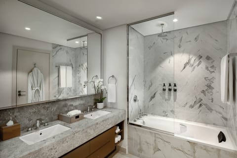 Combined shower/tub, free toiletries, hair dryer, slippers