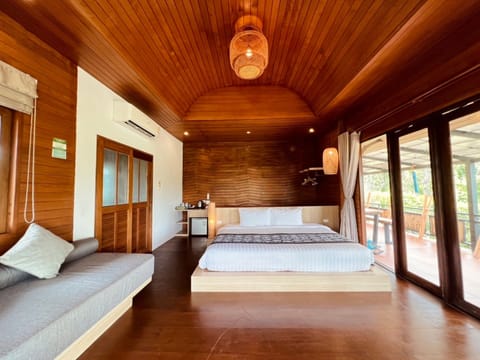 Family Room, 2 Bedrooms, Sea View | Minibar, in-room safe, individually decorated, individually furnished