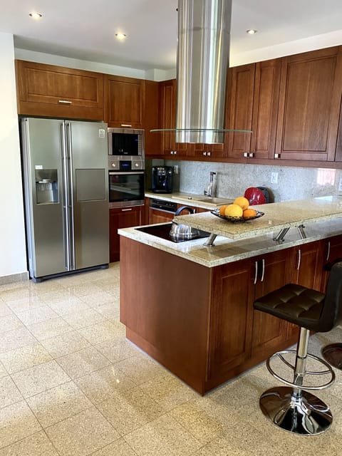 Superior Apartment, 3 Bedrooms | Private kitchen | Full-size fridge, microwave, oven, stovetop