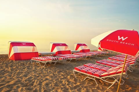 On the beach, beach cabanas, sun loungers, beach umbrellas