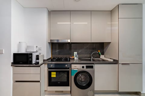 Classic Apartment, Balcony, Pool View | Private kitchen | Espresso maker, electric kettle, toaster, freezer