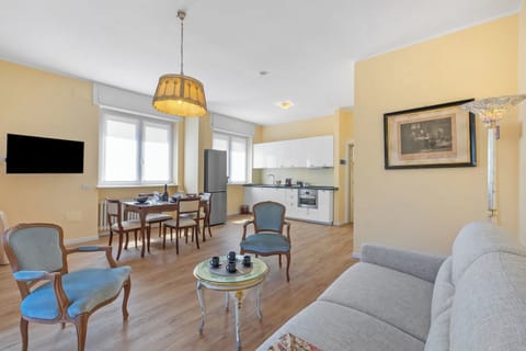 Family Apartment, 1 Bedroom (Strixia Apartment Stresa 50m From) | Living room | 21-inch flat-screen TV with cable channels