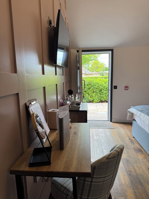 Deluxe Double or Twin Room, Patio | In-room safe, desk, laptop workspace, iron/ironing board