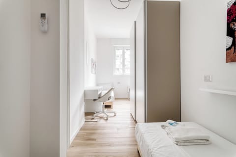 Apartment, 2 Bedrooms | Desk, laptop workspace, iron/ironing board, free WiFi