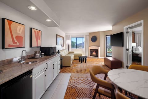 Suite, 1 King Bed, Balcony, Mountain View (Whirlpool) | Living area | 27-inch LCD TV with cable channels, TV, pay movies