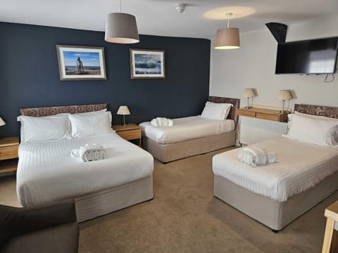 Standard Room (sleeps 4) | In-room safe, iron/ironing board, cribs/infant beds, free WiFi