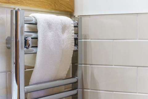 Rainfall showerhead, free toiletries, hair dryer, towels