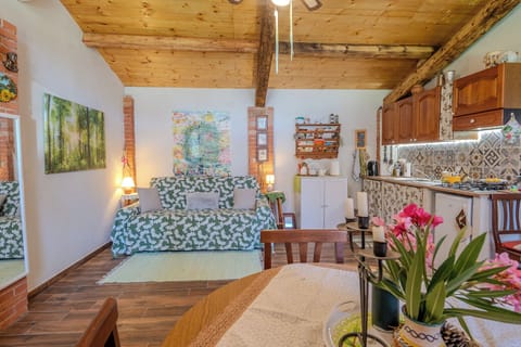 Loft, Garden View | Living area | 32-inch TV with digital channels, fireplace