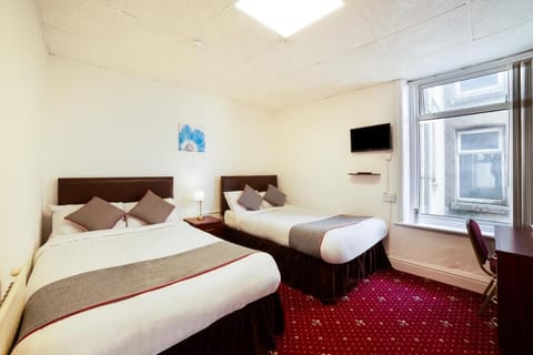 Desk, laptop workspace, free WiFi, bed sheets