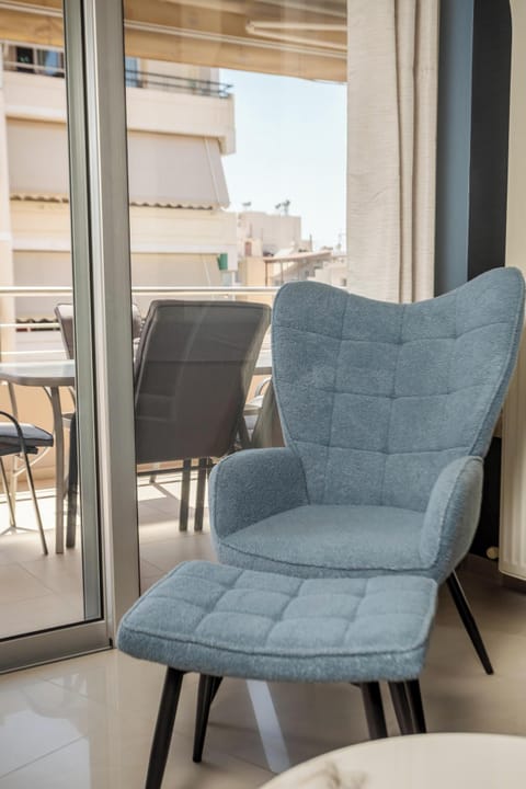 Apartment, City View | Living area | 50-inch Smart TV with cable channels