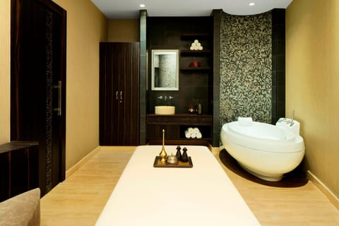 Sauna, spa tub, steam room, deep-tissue massages, Swedish massages