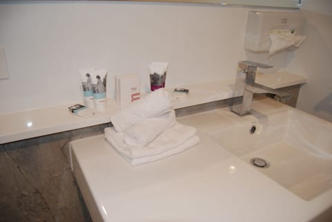 Superior Room, 2 Queen Beds | Bathroom amenities | Eco-friendly toiletries, hair dryer, towels