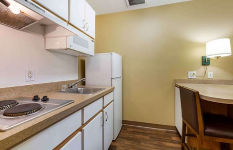 Studio, 1 King Bed, Non Smoking | Private kitchen | Full-size fridge, microwave, stovetop, coffee/tea maker