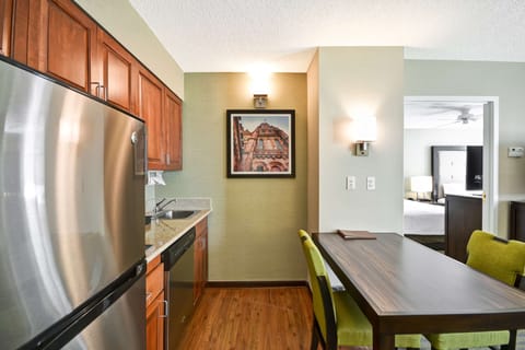 Suite, 2 Bedrooms | Private kitchen | Full-size fridge, microwave, stovetop, dishwasher