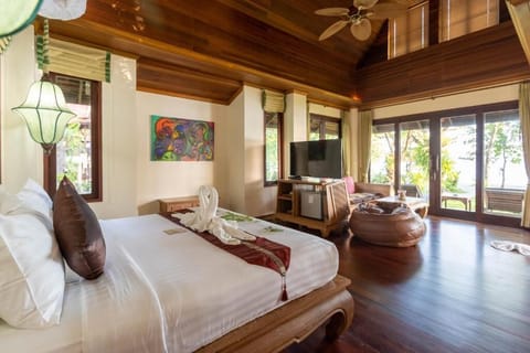 Beach Front  Villa | Living area | Flat-screen TV