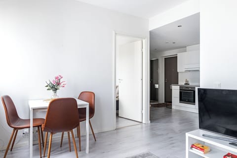 Superior Apartment | Living area | 42-inch Smart TV with cable channels