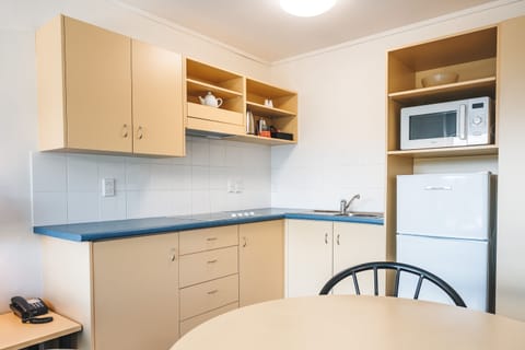 Family Apartment, 2 Bedrooms | Private kitchen | Mini-fridge, microwave, coffee/tea maker, electric kettle