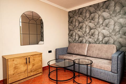 Family Quadruple Room | In-room safe, blackout drapes, free WiFi, bed sheets