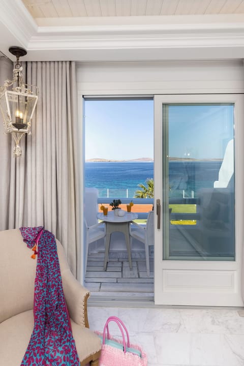 Signature Aegean Room with Outdoor Jetted Tub & Sea View | Minibar, in-room safe, blackout drapes, soundproofing