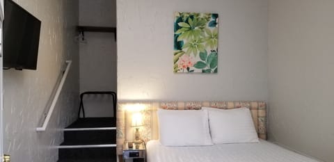 Classic Room, 2 Queen Beds, Refrigerator & Microwave | Free WiFi, bed sheets