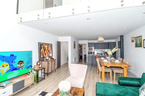 Family Apartment, Balcony, Garden View | Living area | 65-inch Smart TV with digital channels