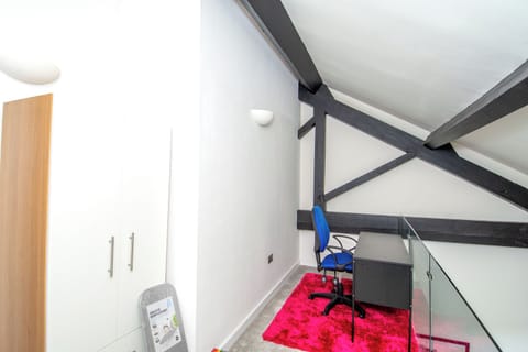 Family Apartment, Balcony, Garden View | Living area | 65-inch Smart TV with digital channels