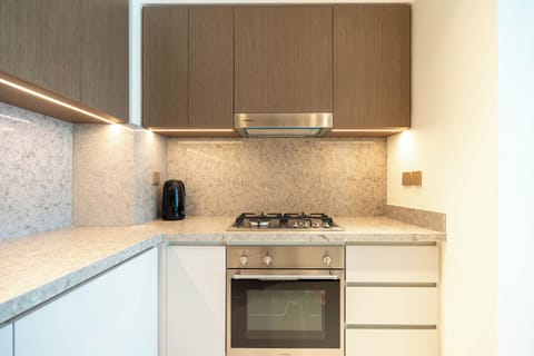 Deluxe Apartment, Balcony, Sea View | Private kitchen | Full-size fridge, microwave, oven, stovetop