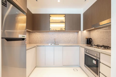 Deluxe Apartment, Balcony, Sea View | Private kitchen | Full-size fridge, microwave, oven, stovetop