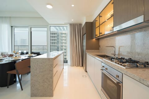 Deluxe Apartment, Balcony, Sea View | Private kitchen | Full-size fridge, microwave, oven, stovetop