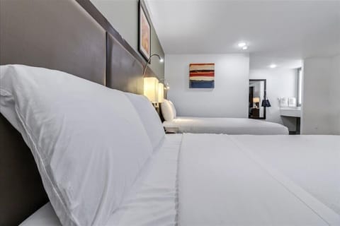 Desk, laptop workspace, free WiFi, bed sheets