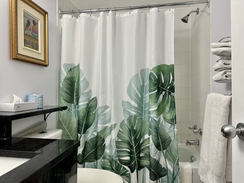 Standard Room, 2 Queen Beds | Bathroom | Shower, hair dryer, towels, soap