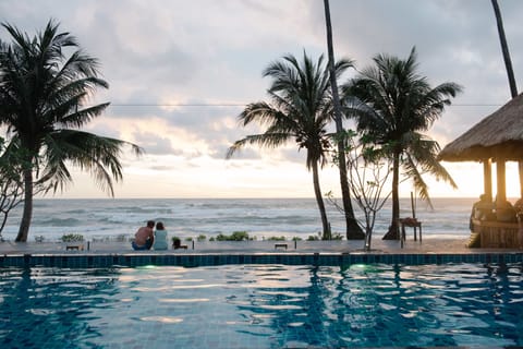 Outdoor pool, pool umbrellas, sun loungers