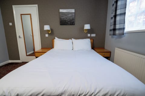 Double Room | Desk, blackout drapes, iron/ironing board, free WiFi