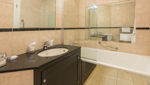 Combined shower/tub, free toiletries, hair dryer, bathrobes