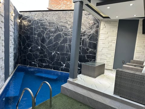 Outdoor pool, open 8:00 AM to 8:00 PM, pool umbrellas, sun loungers