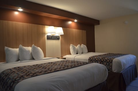 Deluxe Room, 2 Queen Beds, Non Smoking | Premium bedding, blackout drapes, free WiFi, bed sheets