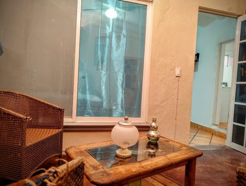 Deluxe Room, Garden View | Living area | 30-inch Smart TV with cable channels