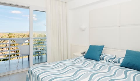 Double Room, 2 Twin Beds, Partial Sea View | Desk, laptop workspace, free WiFi, bed sheets