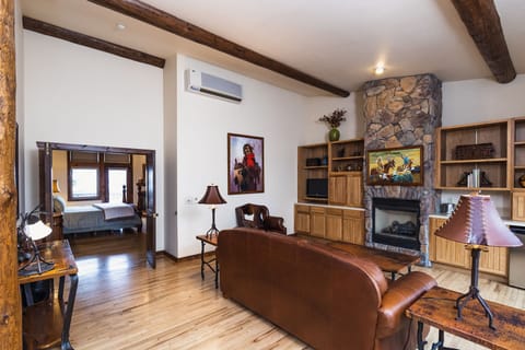 Cattle Baron | Living area | 20-inch flat-screen TV with cable channels, TV, fireplace