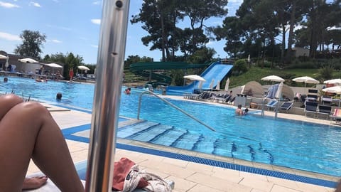 Indoor pool, outdoor pool, pool umbrellas, sun loungers