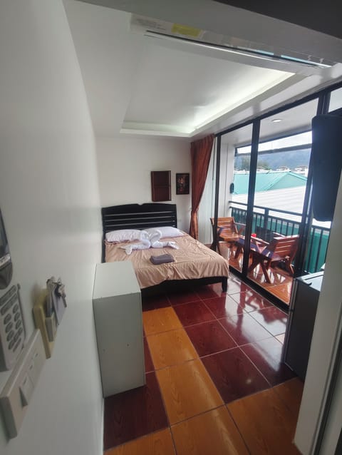 Economy Double Room, Balcony | In-room safe, blackout drapes, free WiFi, bed sheets