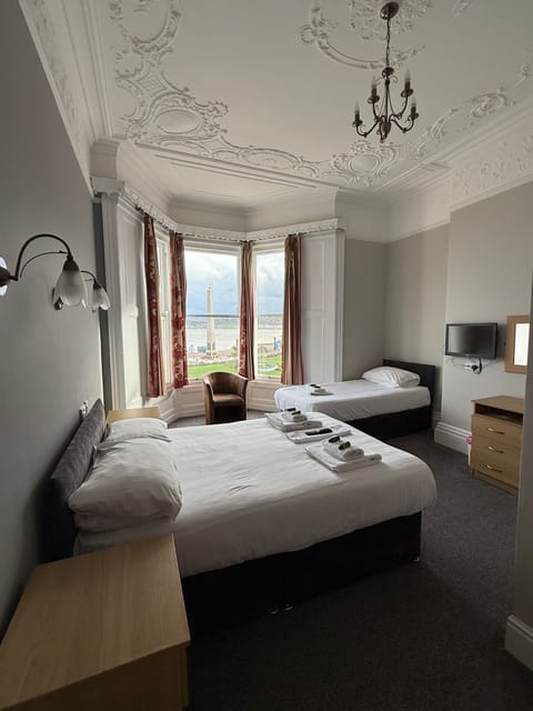 Family Room, Sea View | Desk, iron/ironing board, free WiFi