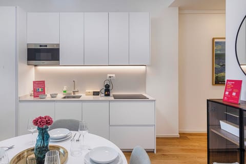 Apartment, 1 Queen Bed with Sofa bed, Partial Sea View | Private kitchen | Fridge, microwave, oven, stovetop