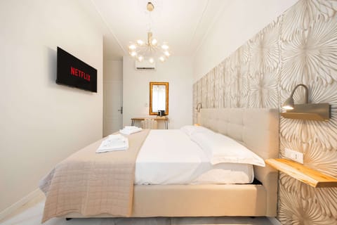 Frette Italian sheets, premium bedding, down comforters