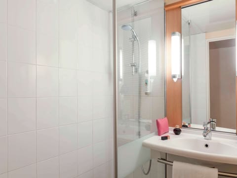 Shower, eco-friendly toiletries, hair dryer, towels