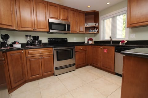 Deluxe Condo, 2 Bedrooms | Private kitchen | Microwave, coffee/tea maker, cookware/dishes/utensils